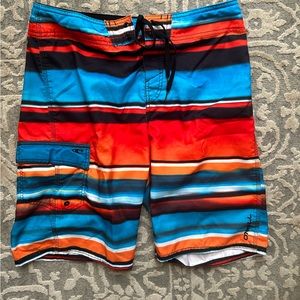 O’Neil swim trunks lightly worn